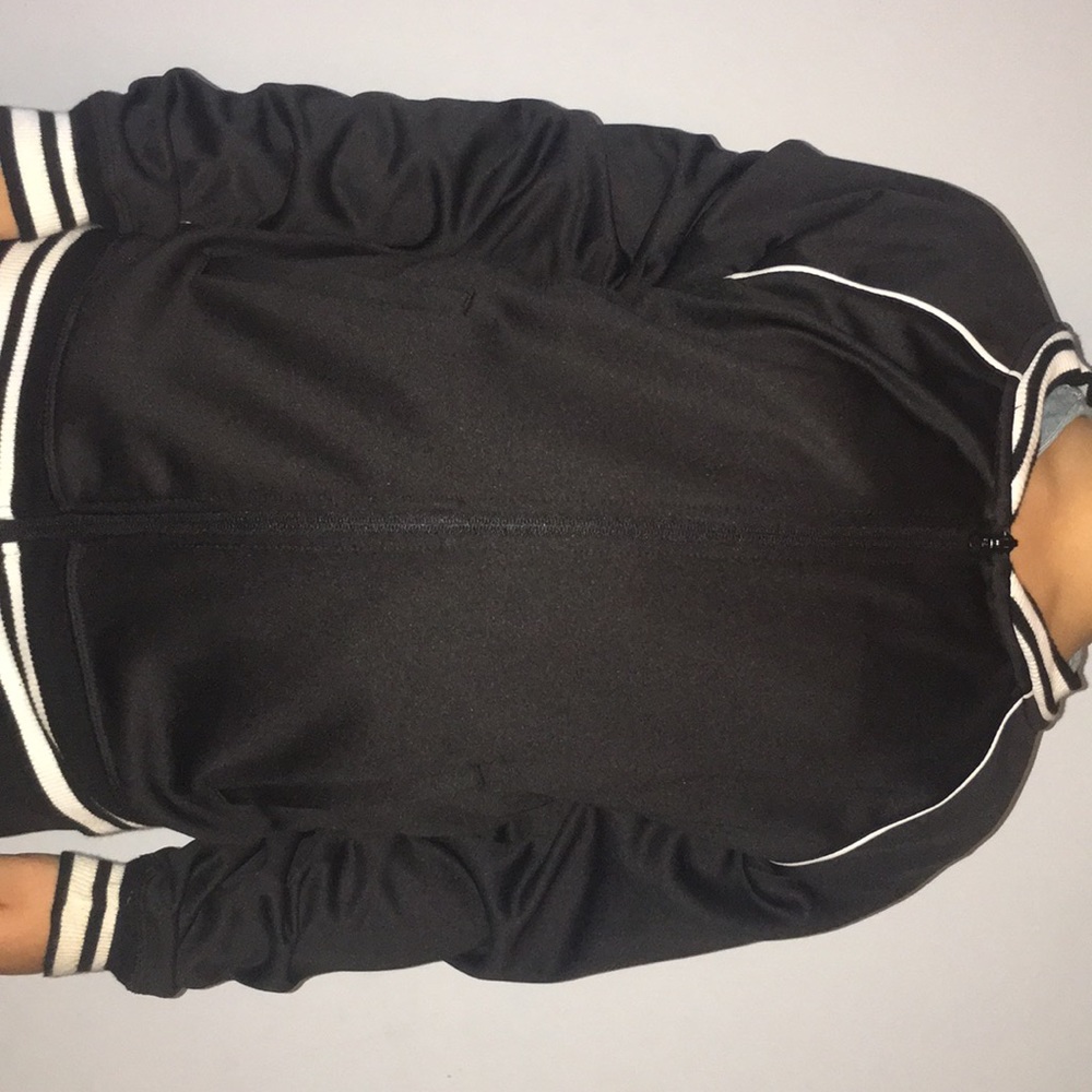 black and white jacket, stripes down.